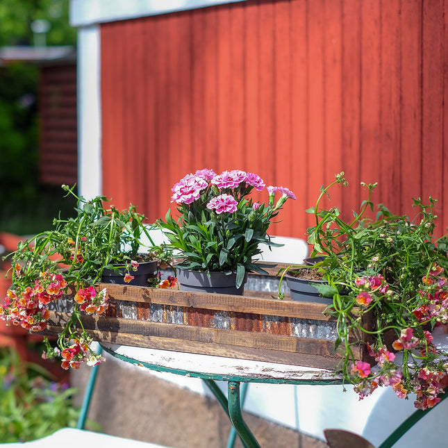 Rustika brickor i trä och zink