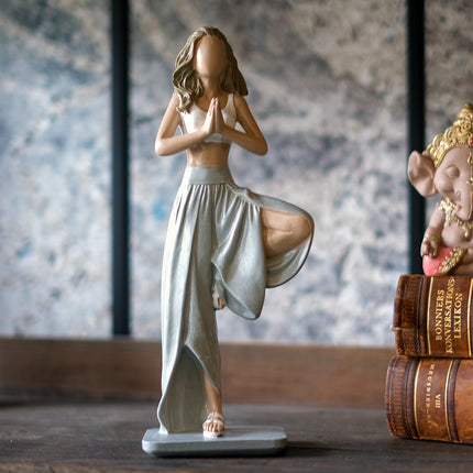 Yoga statyett kvinna