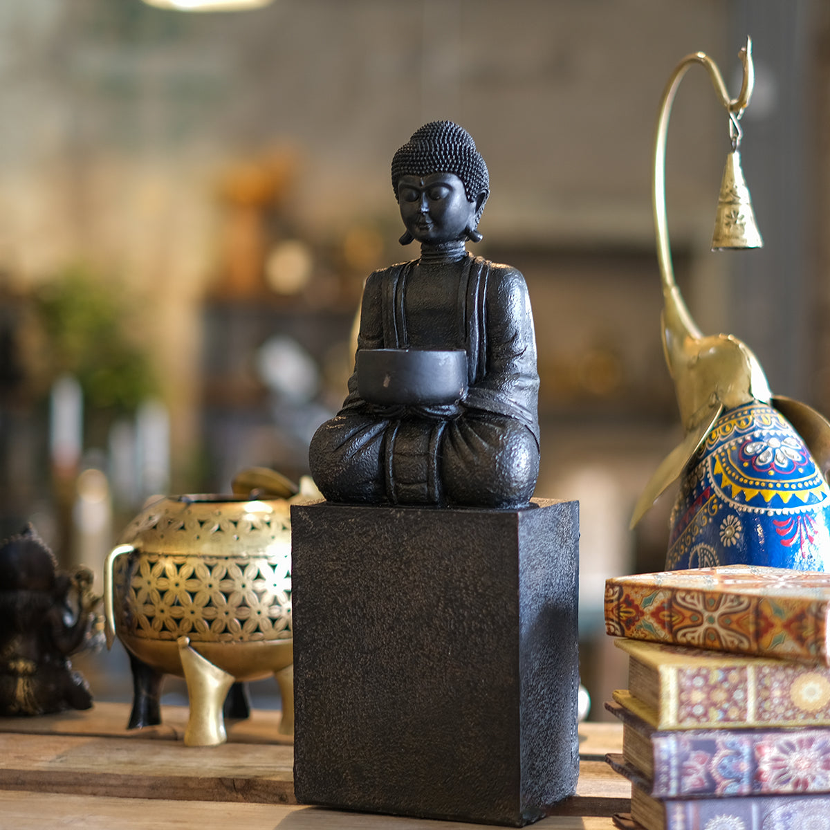 Buddha värmeljus på sockel