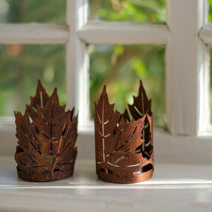 Rostig värmeljushållare lönnlöv