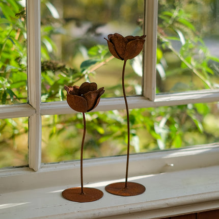 Rostig värmeljusstake vallmo