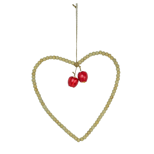 Hjärta med träkulor och röda äpplen