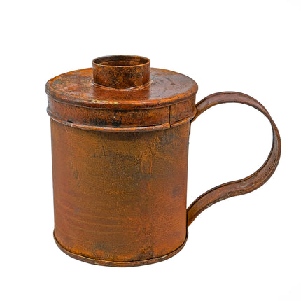 Rostig burk värmeljus