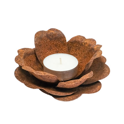 Rostig värmeljushållare ros