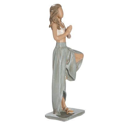 Yoga statyett kvinna