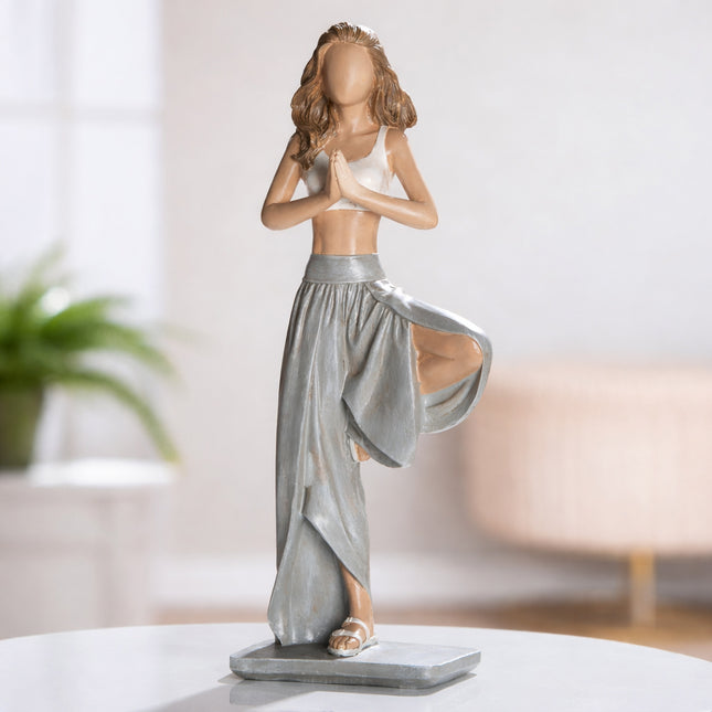 Yoga statyett kvinna